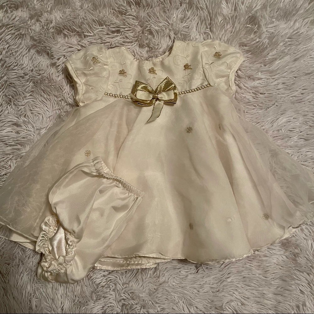 Beautiful cream and gold infra the dress